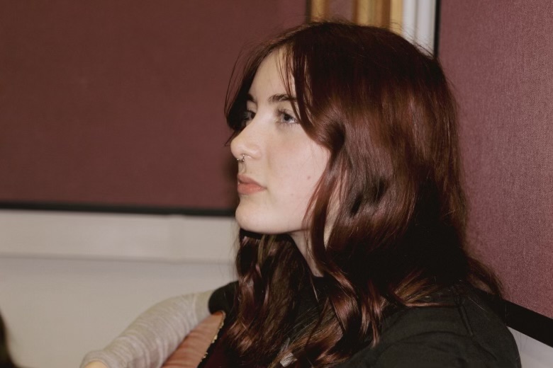 April and Lucien in a warm vintage-styled band photograph
